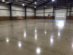 Epoxy removal to polished concrete