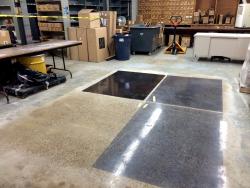 Polished concrete with different levels of black dye